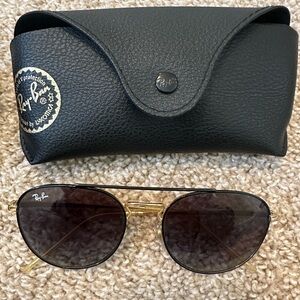 Rayban sunglasses, I think aviators